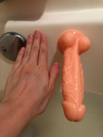Handjob in front of a mirror